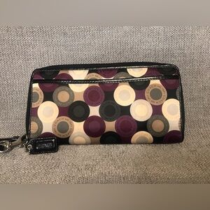Coach wallet with wristlet option.
